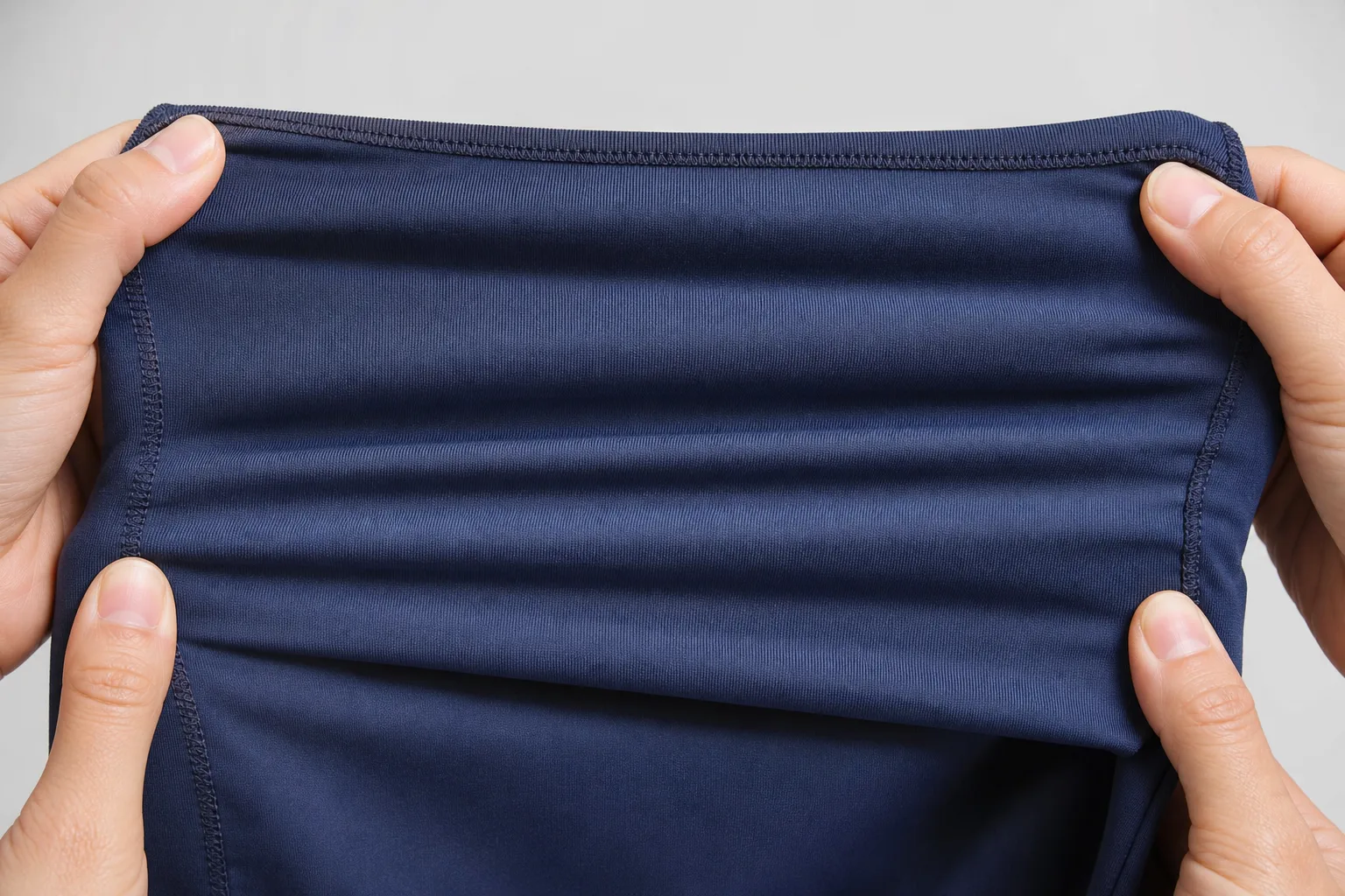 Close-up of compression activewear fabric stretch and recovery